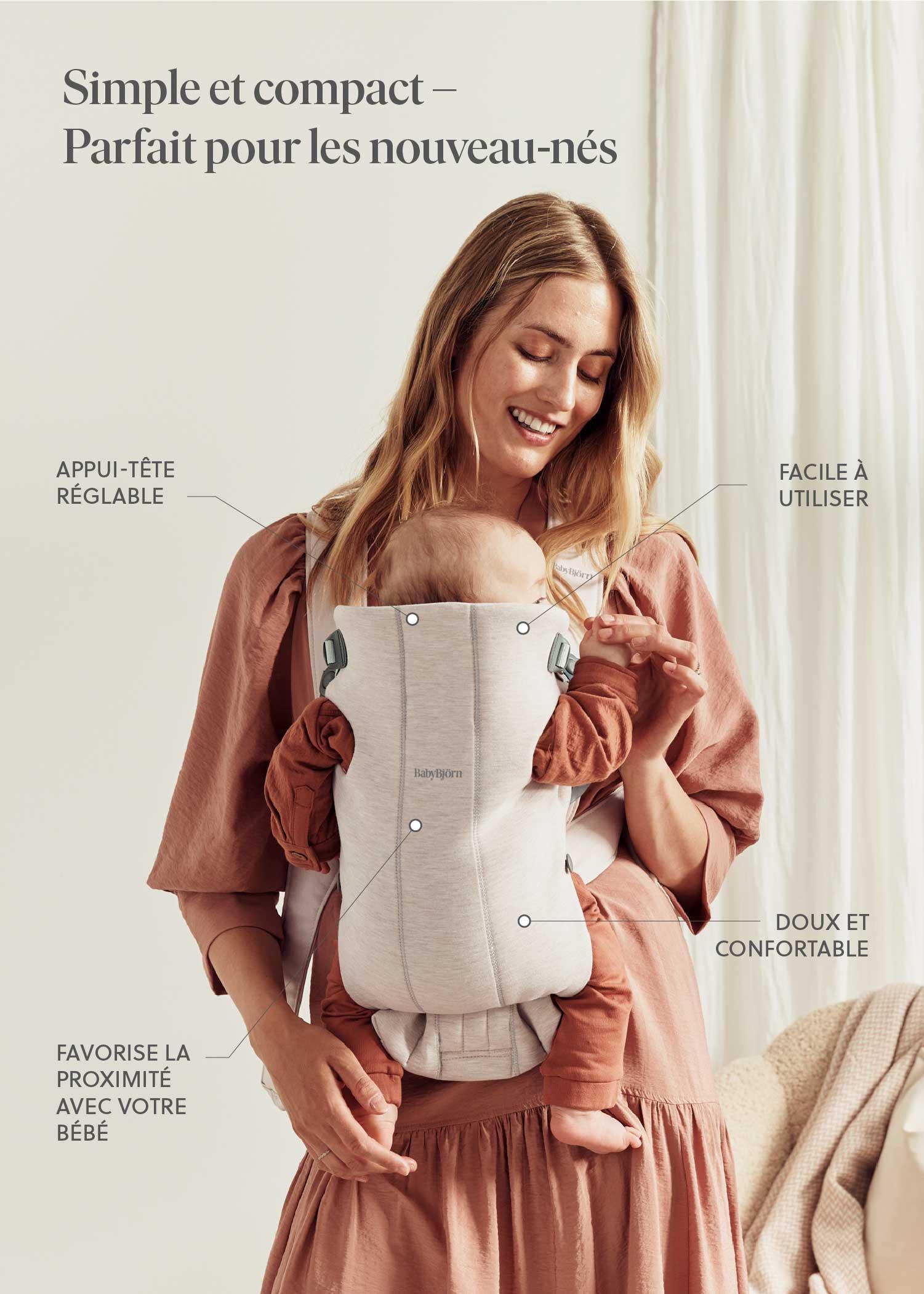 A smiling woman wearing a pink dress holds a baby in a beige carrier, with French text highlighting features like comfort, ease of use, and adjustable headrest.